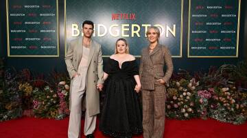 Luke Newton who plays Colin Bridgerton, Nicola Coughlan who stars as Penelope Featherington and Bridgerton's showrunner Jess Brownell at Netflix's season three launch in Bowral. Picture by Getty Images for Netflix 