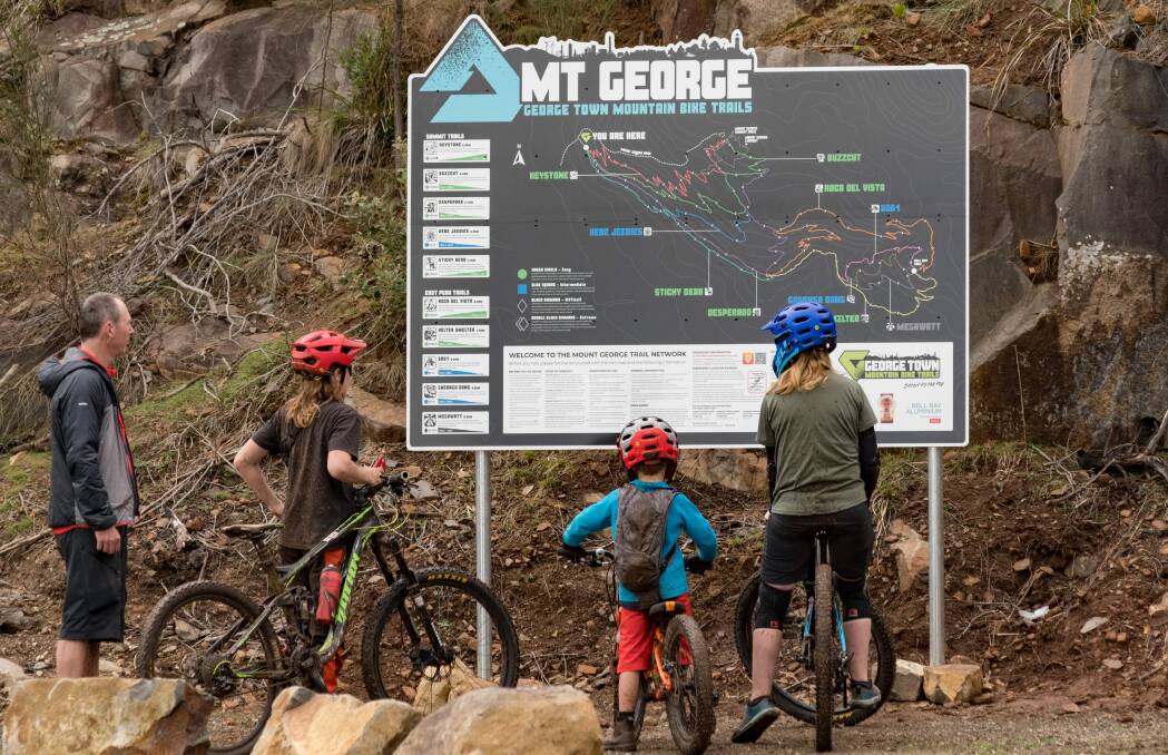 OPEN: Cycling enthusiasts get ready to hit the new mountain bike trails at George Town. Picture: Phillip Biggs