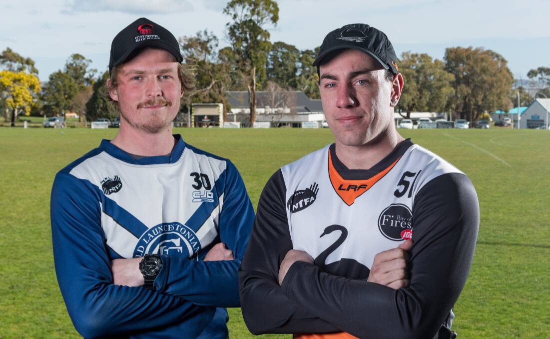 Ball-up: Old Launcestonians' Campbell Fraser and East Coast Swan's Ethan Goldfinch ready to fight for a grand final spot. Picture: Phillip Biggs