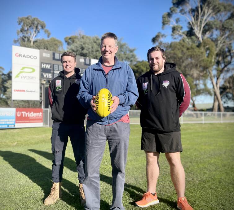 READY TO RUMBLE: Hillwood's Mack Blazely and Alistair Taylor with vice-president Tony Newport ahead of their major game against George Town. Picture: Adam Daunt