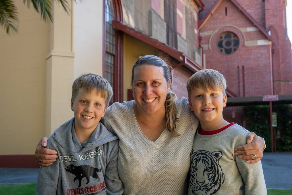 EASTER: Kirsten Bryce and her sons, Xavier 8 and Hunter 6 of Melbourne ATTENDING Easter Sunday at St Johns Church. Picture: Paul Scambler 