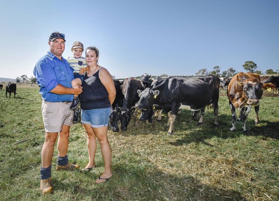 AWARDS: Woodrising Dairies have been nominated as a finalist in Tasmanian Dairy Awards. Famer Troy Ainslie and son Albie, 4 and wife Toni run Woodrising Dairies. Picture: Craig George