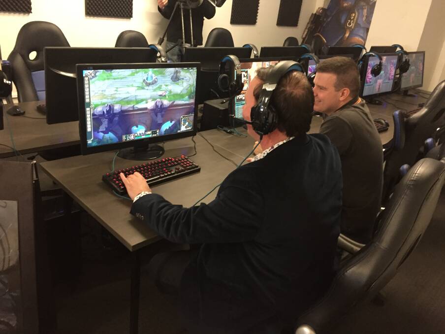 A LEGEND: Launceston acting mayor Danny Gibson tries his hand at some League of Legends. Picture: Adam Daunt 