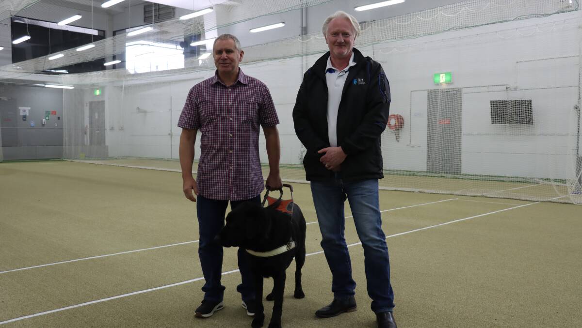 WINNERS: Blind cricket ambassador Phil Menzie (left) and Inclusive Innovations Tasmania chief executive Philip Drury (right) welcomed Blind Cricket Tasmania's national award win recently. Picture: Cricket Tasmania