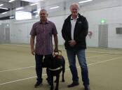 WINNERS: Blind cricket ambassador Phil Menzie (left) and Inclusive Innovations Tasmania chief executive Philip Drury (right) welcomed Blind Cricket Tasmania's national award win recently. Picture: Cricket Tasmania