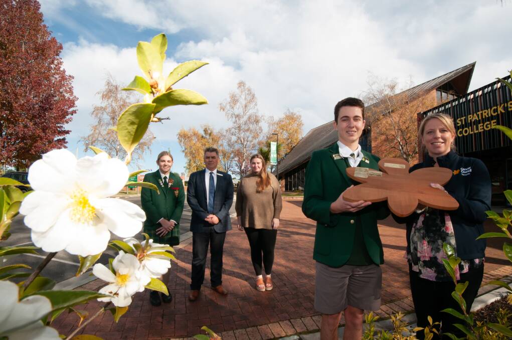 RECOGNISED: St Patrick's College students Trilelle Vimpany-Tubb and Harrison Mills, college Principal Tony Daley, orthern Relay For Life co-ordinator Zoe Vandervelde, state manager Relay For Life Alica van Ek at the Spirit of Relay award presentation. Picture: Phillip Biggs
