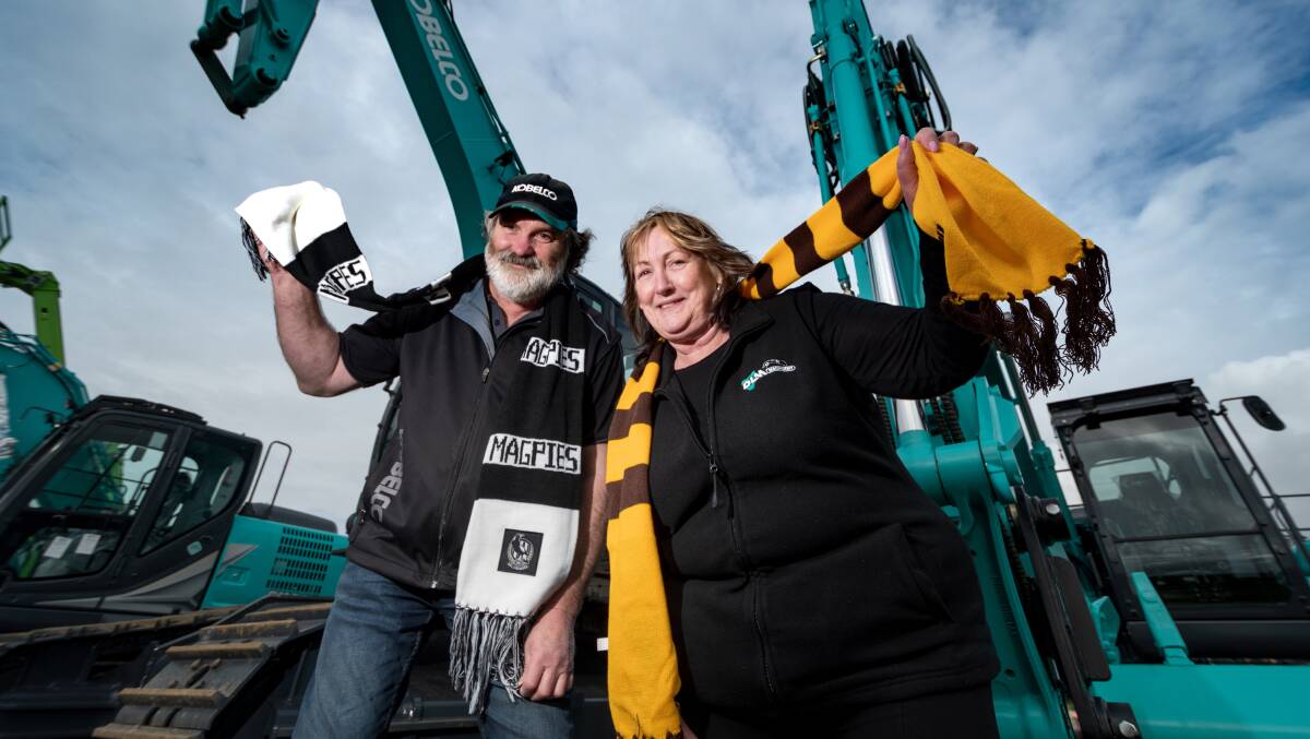 SUPPORT: Family ties will be set aside as husband and wife David and Leanne Morrison watch their Hawthorn and Collingwood teams do battle at UTAS Stadium for premiership points this weekend. Picture: Phillip Biggs
