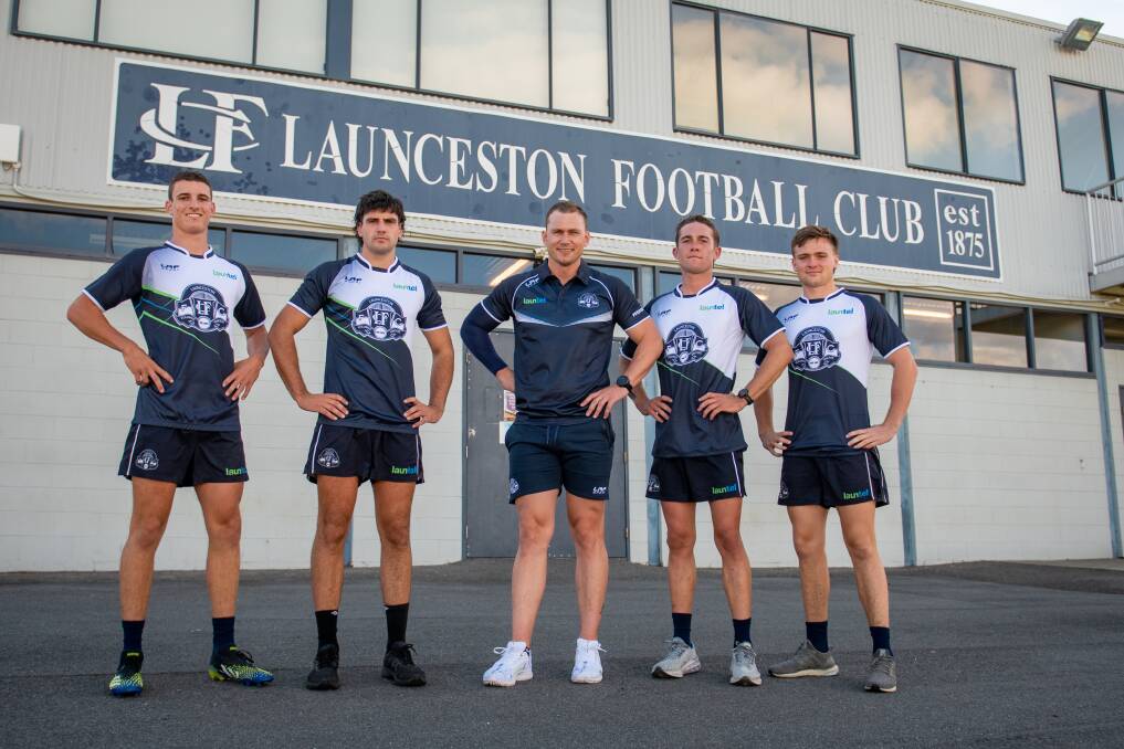 NEW ROOS: Launceston coach Mitch Thorp with Josiah Burling, Alec Wright, Jacob Boyd and Zach Morris who have joined North Melbourne's VFL list. Picture: Paul Scambler