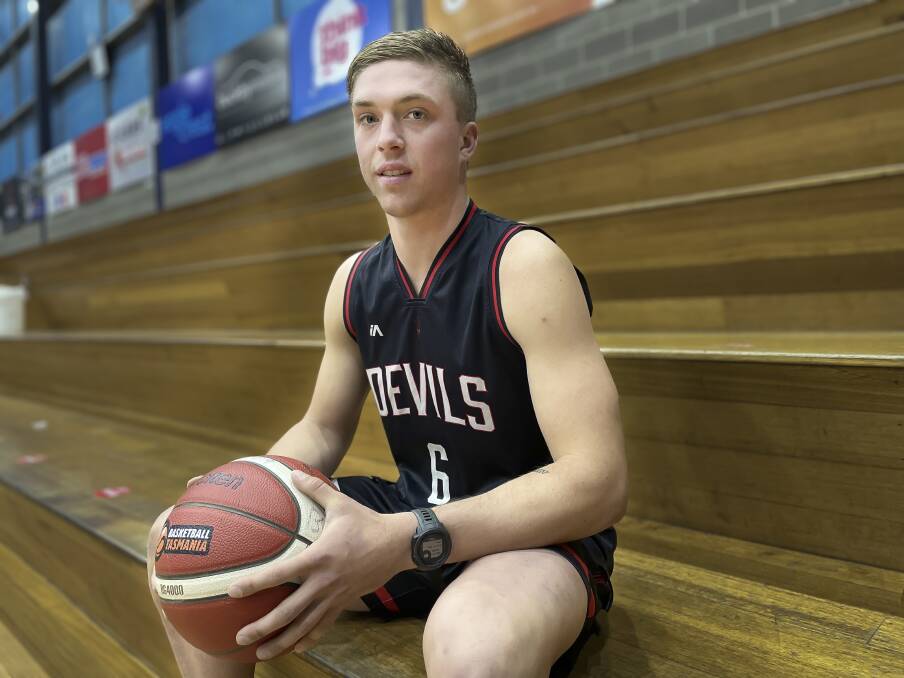 Lachlan Cocker shapes as a key player for the South East Launceston Devils in the men's LBA grand final. 