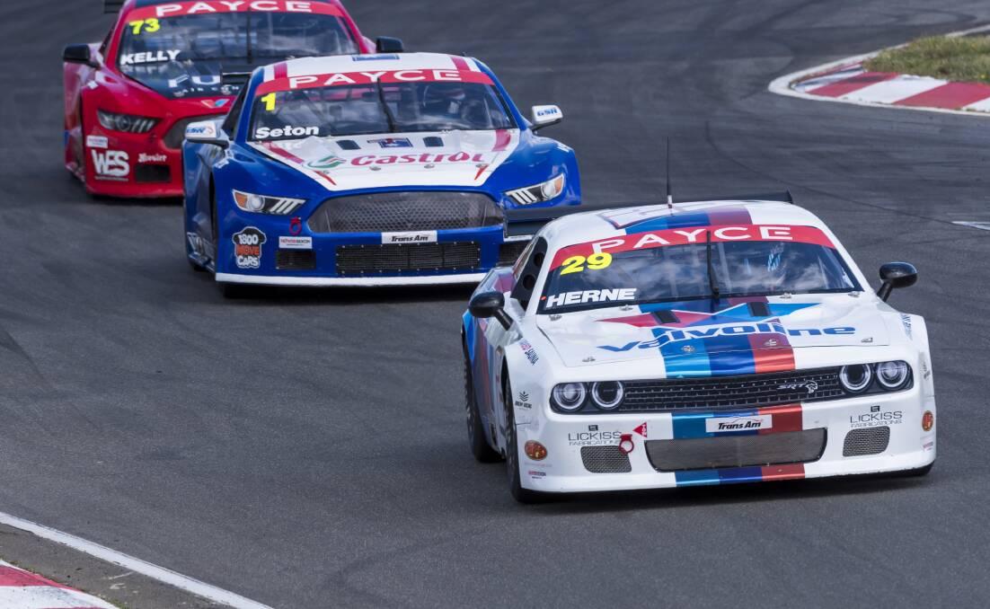 WHEELS: Nathan Herne leads a pack in the Trans Am event at Symmons Plains in Janurary. Picture: Phillip Briggs 