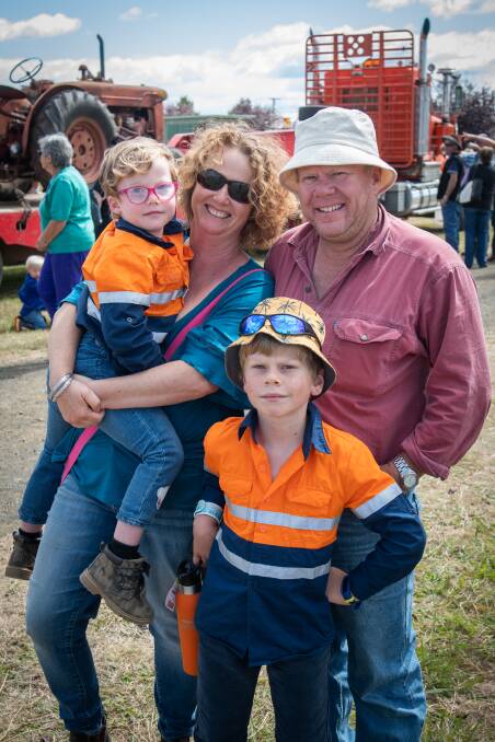 TRUCKS: Erin Breen, with Elizabeth Goninon 5, Oscar Goninon 8 and Tim Goninon of Longford enjoying the RFDS Tasmania truck run. Picture: Paul Scambler