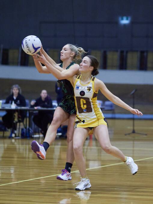 FIERCE: Shelby Miller and Lydia Coote compete for the ball as the Northern Hawks booked their grand final spot. Picture: Rod Thompson