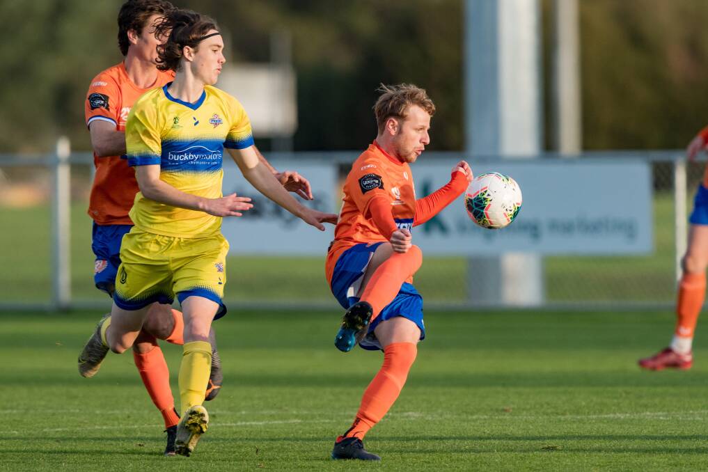 DEFEAT: Riverside Olympic and Liam Poulson tasted another defeat in NPL Tasmania against the Devonport Strikers. Pictures: Phillip Biggs