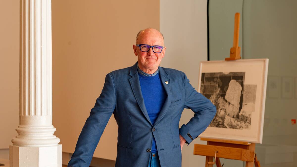 Masterpiece: Tasmanian artist Raymond Arnold with a fragment of his latest major work, Elsewhere World Picture: Phillip Biggs