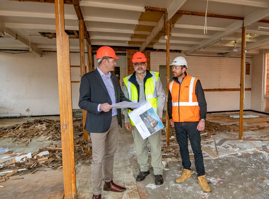 Minister for State Development Construction and Housing Michael Ferguson, Project Manager at the Department of Communities Tasmania Stephen Yam and Vos Northern Construction manager Brent Wilcox. Picture: Paul Scambler