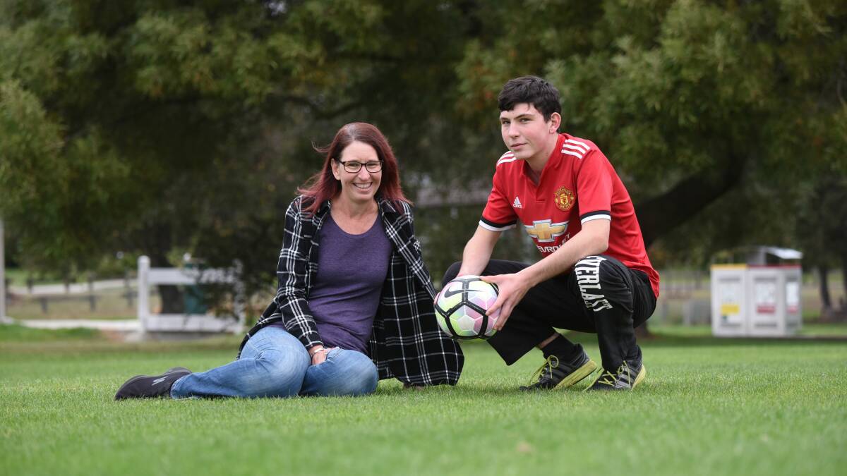 ADVOCATE: Children and Young People with Disability Australia director Kristen Desmond with her son Oscar. Pictures: Paul Scambler 