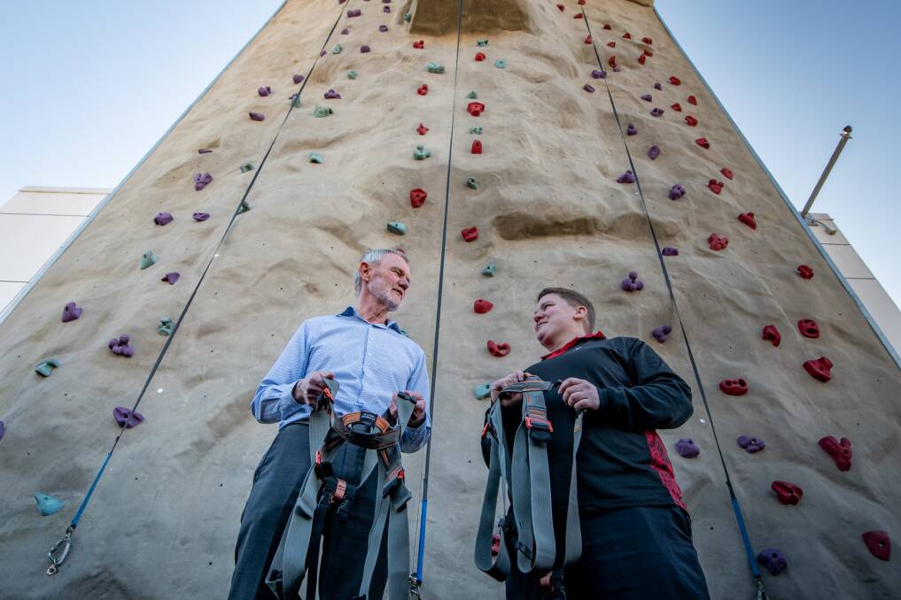 Mayor Albert Van Zetten with YMCA Program leader Emily Olendrowsky at the YMCA climbing wall. Pictures: Paul Scambler