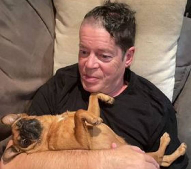 David Gibson with his beloved Ruby, who ran away from Stillwater Restaurant on Wednesday. Image: supplied