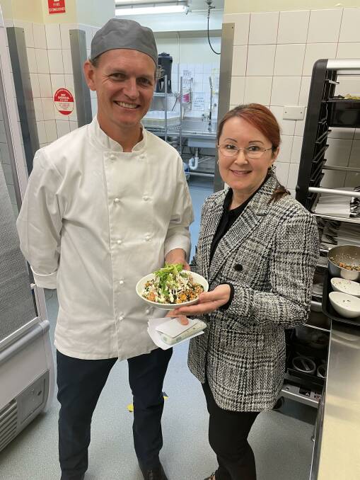 BON APPETIT: Chef John O'Shea and St Helen's director of nursing Sarah Llarena with a dish from the new fine dining menu. Picture: Supplied