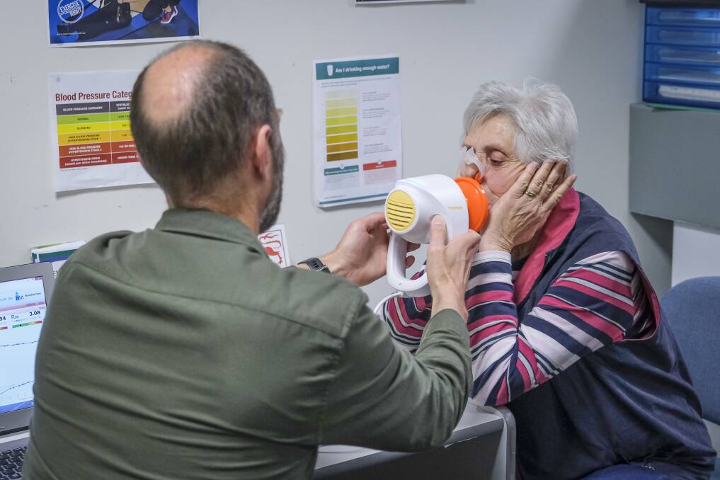 NO SMOKING: Associate Professor Andrew Williams and COPD patient Ella Miller at the UTAS School of Health Sciences, Exercise Clinic at Newnham. Picture: Craig George