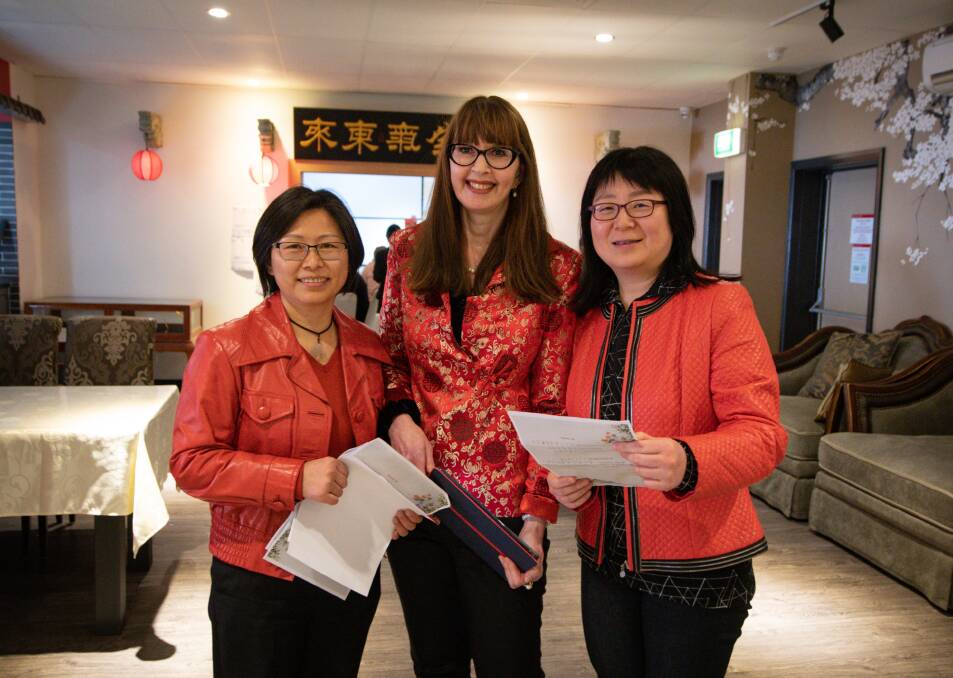 ALL TALK: Bing Xu and Louise Ives with UTAS Chinese Global Cultures and Languages co-ordinator Isabel Wang. Picture: Paul Scambler