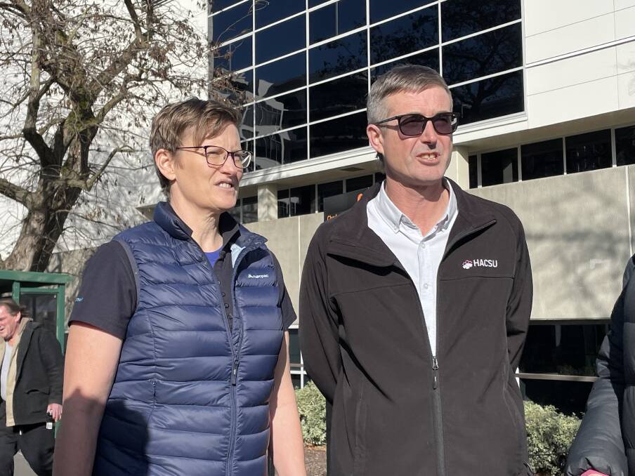 FAIR PAY: Alison Mclean and Lucas Digney outside the Launceston General Hospital. Picture: Andrew Chounding 