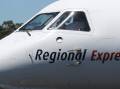 Evacuated: A Rex Airlines plane travelling from Melbourne to Burnie via King Island didn't take off after reports of flames coming from the engine.