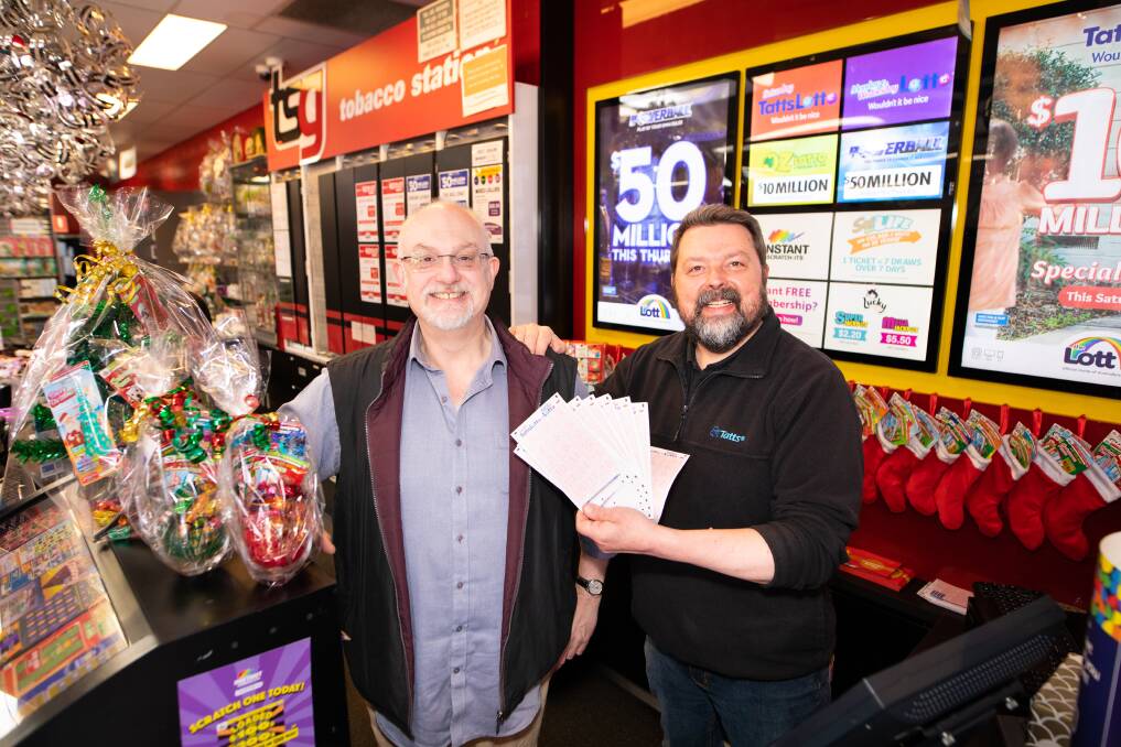 Waterfront News and Lotto owners Chris Bates and Rod Hurley were very excited that the winning ticket was bought from their outlet. Picture by Eve Woodhouse.