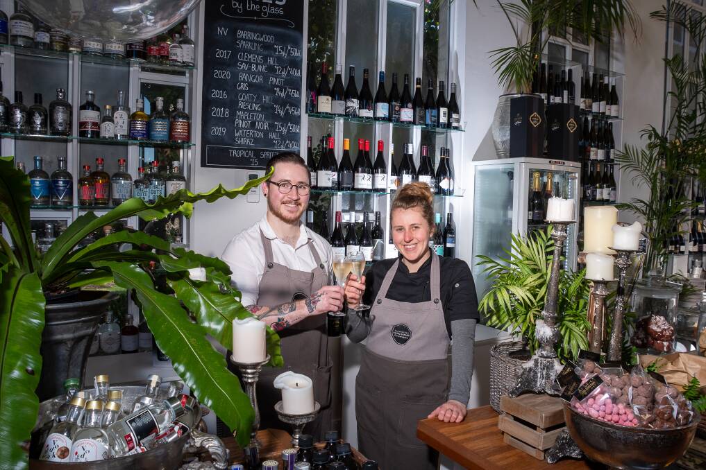 Cheers to that: Tasmanian Food and Wine Conservatory front of house manager Mitchell Berwick and co-owner Brielle Mason. The company is a finalist in the Tasmanian Wine List of the Year awards. Picture: Simon Sturzaker.