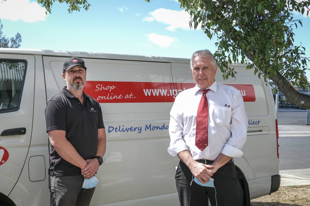 GIVING: Travis Allen and David Baxter from Baxters IGA, Prospect aredonating food for the Launceston City Community Christmas lunch. Picture: Craig George 
