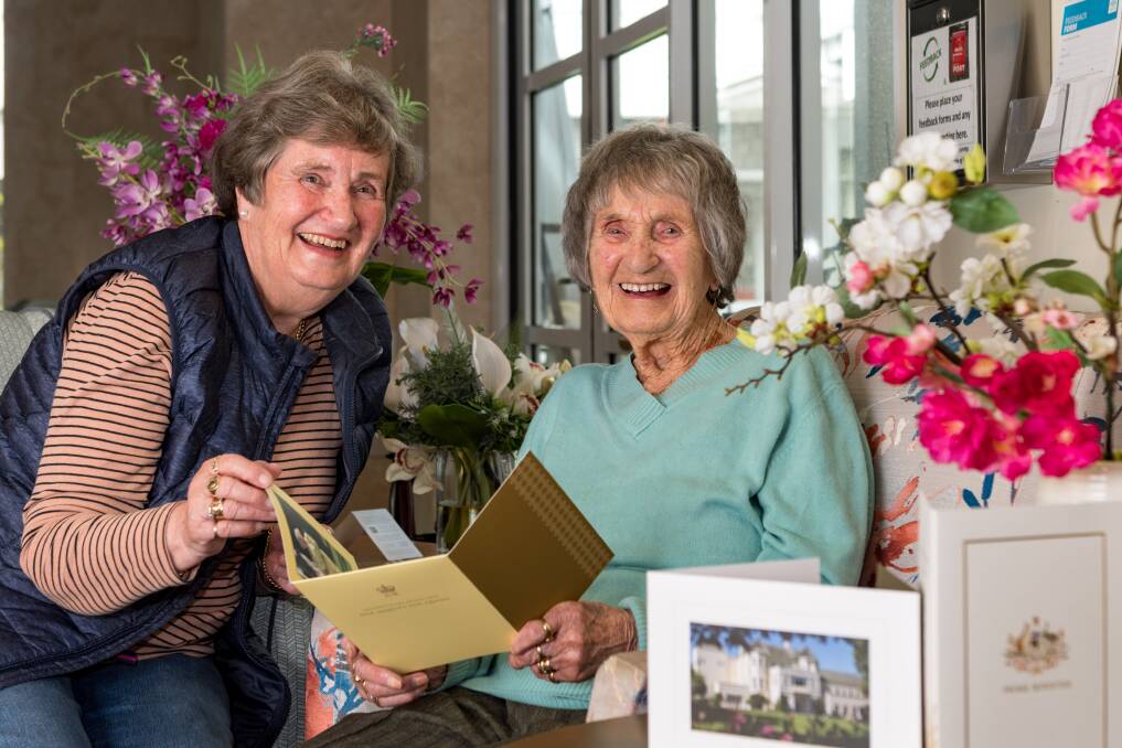 CENTENARIAN: Lynne Seaton with her mother Barbara Miller, who is celebrating her 100th birthday, read her letter from The Queen, the Govenor General and the Prime Minister. Picture: Phillip Biggs