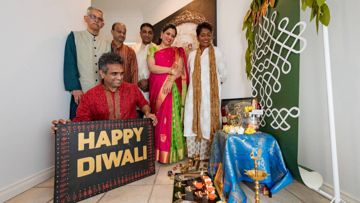 HAPPY DIWALI: Raj Eri in front of Mohan Anantharaman, Moorthy Marayanasamy, Krishna Kalpurath, Shir Eri and Alice Kaushal. Picture: Phillip Biggs