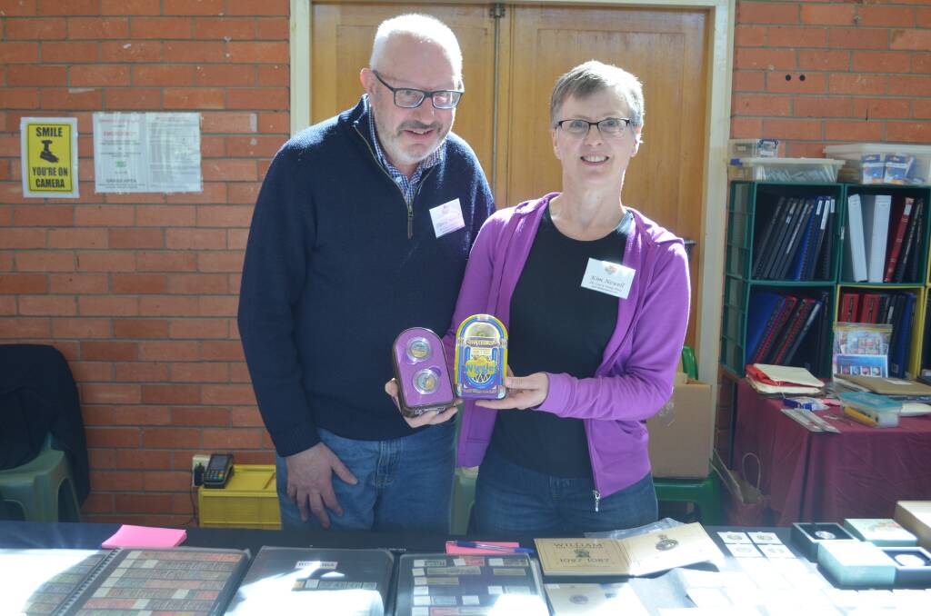 COLLECTORS: David and Kim Newell from The Coin and Stamp Place with a Wiggles collecrors coin. Picture: Nikita McGuire