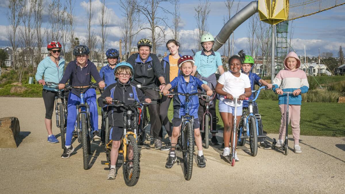 Australian Christian College (ACC) Launceston at their Stride and Ride event.
Teacher Heather Cooper, Principal Marty Powell with students Xavier Millwood, Lilliana Cooper, Blanche Carins, Emeline Cooper, Kate Carins, Lucy Howell, Jamison Cooper, Ethan Carins and Pearl Arydayfio. Picture: Craig George 