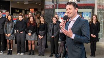 Tyran Parke, Artistic Director, of the Australian Musical Theatre Festival in the Brisbane street mall, opened the festival on Wednesday. Picture: Paul Scambler 
