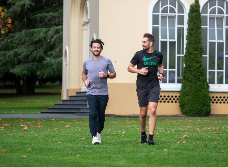 RUNNING FOR A REASON: Sam Thomson of Brisbane and Matthew Bellenger of Launceston will join others in a marathon in Noosa on 28 May in honour of Sam's late father Pete, who passed away after battling motor-neurone disease. Picture: Paul Scambler 
