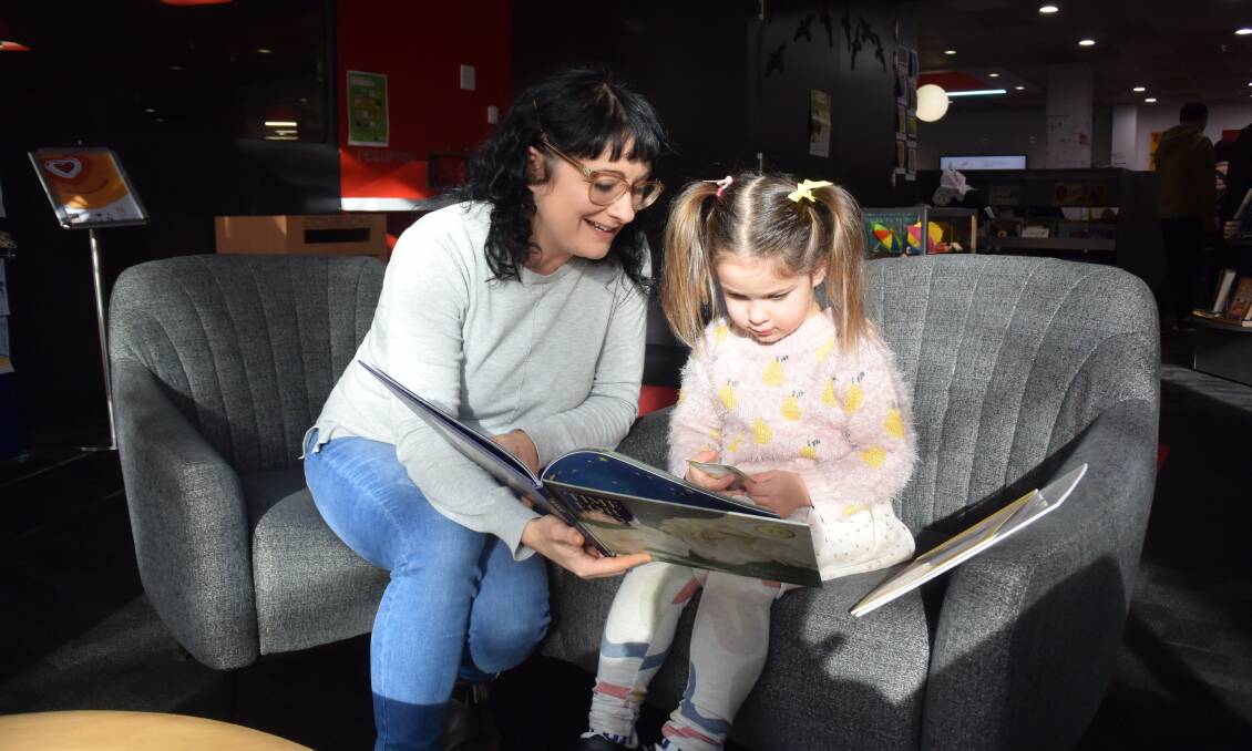 GOOD READ: Emma Carracher of Blackstone Heights with her daughter Valda Agardy, aged 3, at the Launceston Library. Picture: Nikita McGuire 