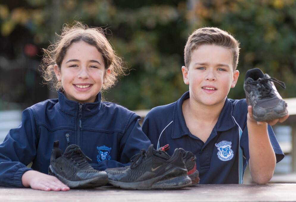 RECYCLED: Nedime Aykaram and Alex White of St Thomas More's Catholic School, who were named the state winners of the Treadlightly's 2022 National School Recycling Drive. Picture: Phillip Biggs