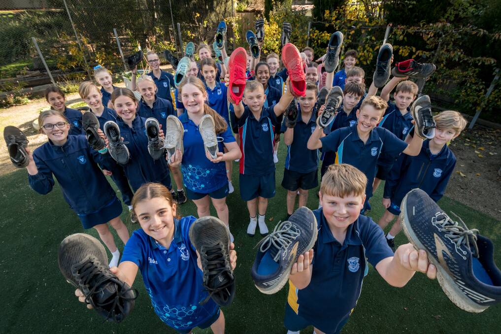 St Thomas More's Primary School, with Grade 6 student Phoebe Dilger and grade 5 student Oscar Gleeson in front. Picture: Phillip Biggs