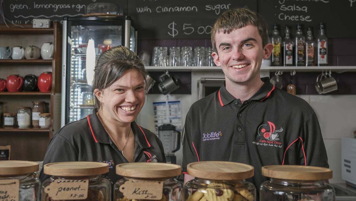 REWARDING JOB: Chelsea Deane and Cameron Lowry at Cafe Next Door. Picture: Craig George 