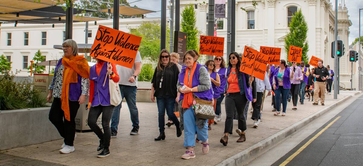 A group of walkers took off into Launceston's CBD on Friday as part of the 16 days of activism. Picture by Paul Scambler 