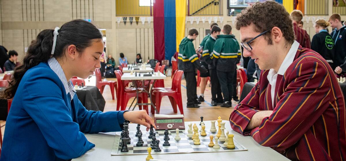 Luwanna Beeton 14 of Grammar pays against Addison Djatschenko 17 of Scotch at the State Interschool Chess Championships. Picture by Paul Scambler 