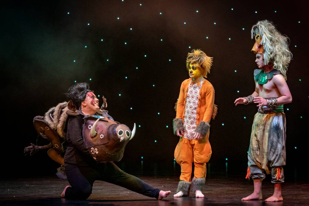 Kaleb Watts as Pumbaa, Tom Wise as Timon with Connor Shephard as Simba. Picture: Paul Scambler 