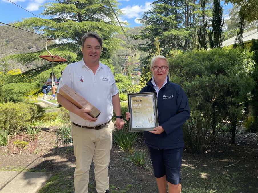 GOLD WINNERS: David and Jo Larter with their Gold award and certificate from the 2021 Tasmanian Tourism Awards. Picture: Nikita McGuire 