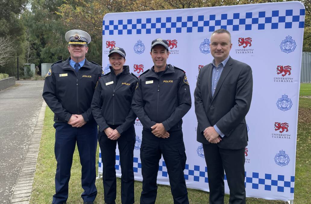 RECRUITS: Tas Police Education and Training Commander Jason Elmer with trainees Melanie Styles and Samuel Fletcher and Head of Social Sciences Professor Nicholas Farrelly. Picture: Nikita McGuire 