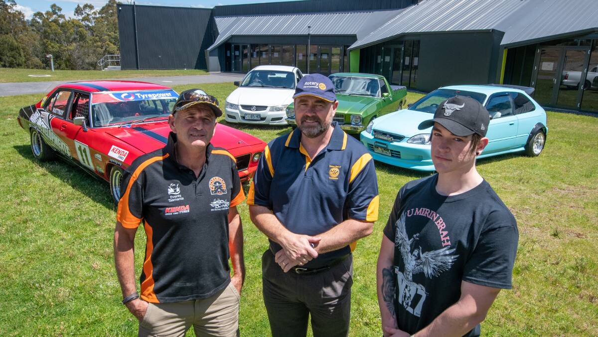 PRIDE AND JOY: Neville Rattray, The Rotary Club of Launceston's president Patrick Ryan, and his son, Henry Ryan with their cars at the Silverdome. Picture: Paul Scambler.