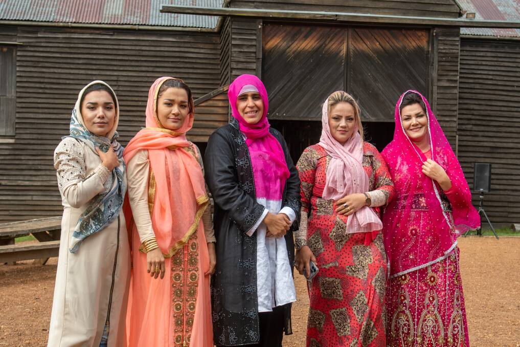 UNITED: Asiyeh Heidari, Saeiideh Heydari, Arizo Iria, Mahtab Alizadeh and Sabereh Jafari celebrating International Women's Day at Brickendon. Picture: Paul Scambler