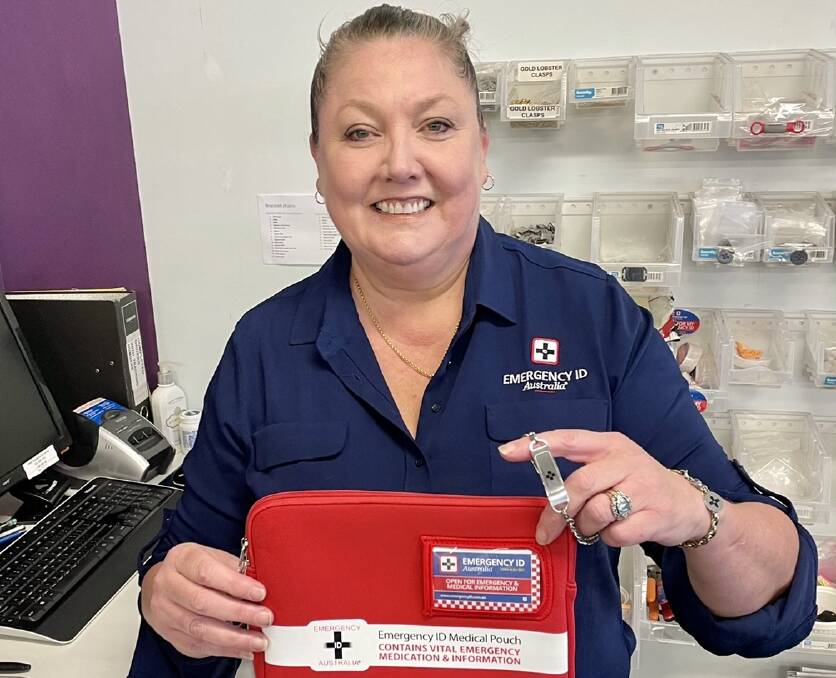 LIFE SAVING: Founder and owner of Emergency ID Australia, Nicole Graham, inside her company's headquarters, with two of her most successful products, a medical bracelet, and medical pouch. Picture: Supplied