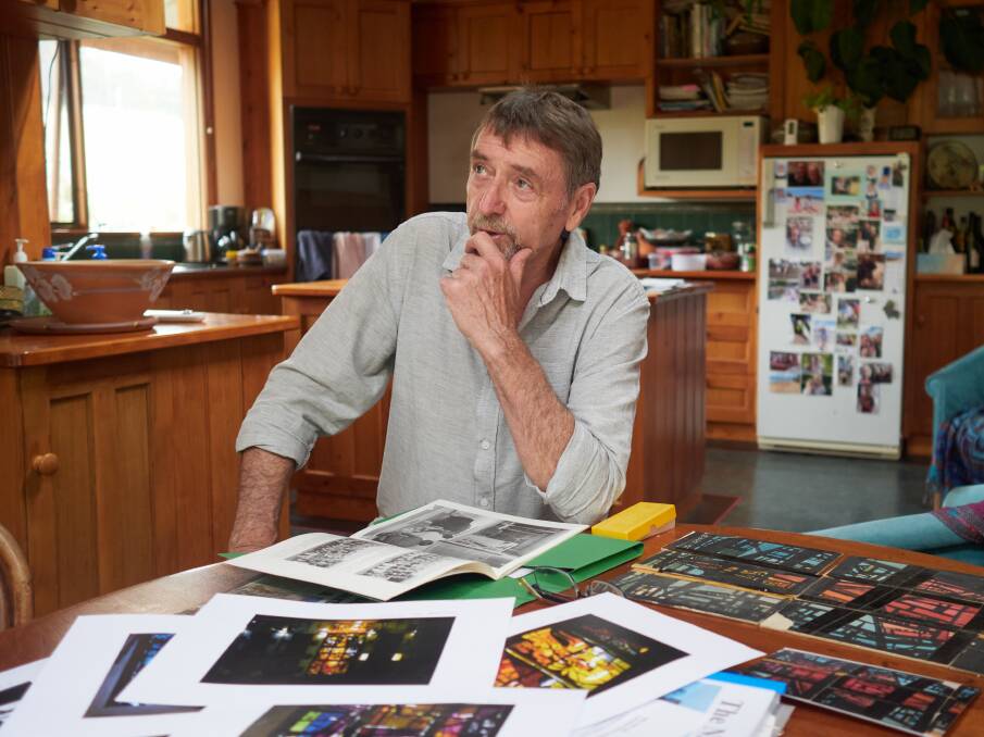 Artist and teacher Fred McCullough at his home in Glengarry with images and plans of 50-year-old Prospect library 1970's art installation. Picture by Rod Thompson