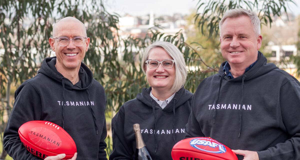 Premier and Minister for Trade Jeremy Rockliff alongside Brand Tasmania chief executive Todd Babiak, and Wine Tasmania chief executive Sheralee Davies. Picture: Phillip Biggs